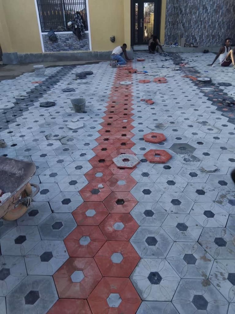 Hexagon paving with a red path through it