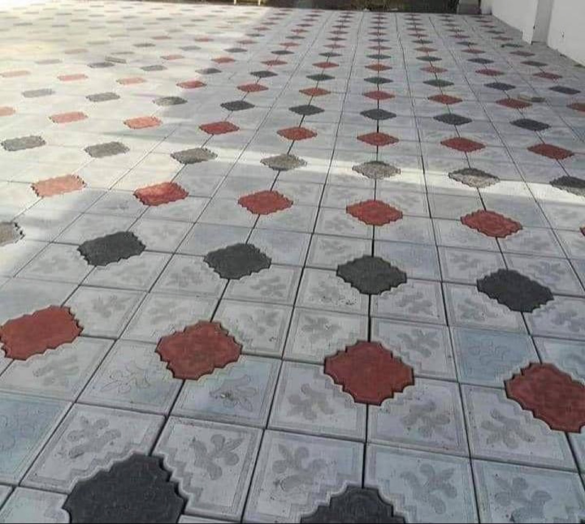 Hexagon paving with red and black centres